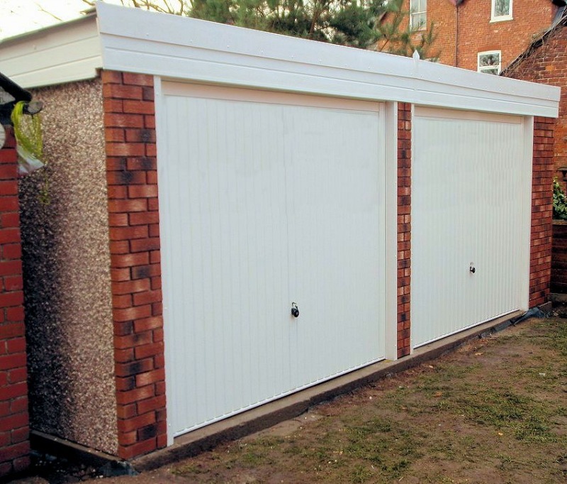 Spar Pent Double Concrete Garage 234 - Brick Posts, PVCu Windows and Fascias Spar Pent Double Concrete Garage 234 - Brick Posts, PVCu Windows and Fascias
